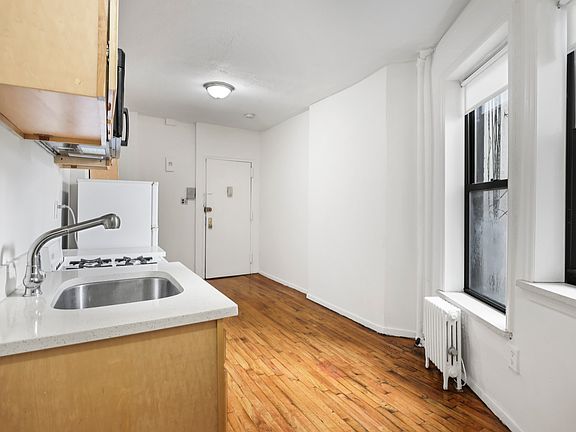 4th image of 242 E 10th St APT 12A