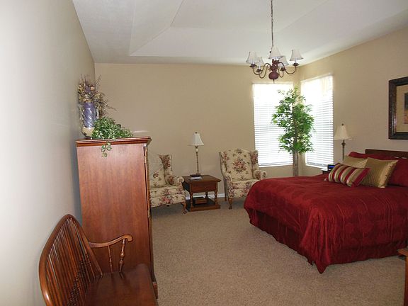 Master bedroom with tray ceiling