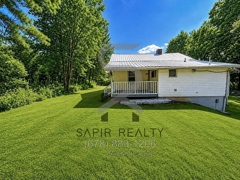 7925 Rivertown Rd — Photo 2