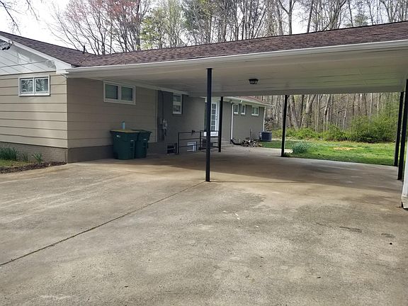 Carport with two covered parking spots.