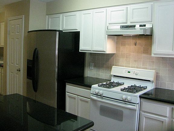 Newer appliances- Refrigerator-Washer & Dryer remain