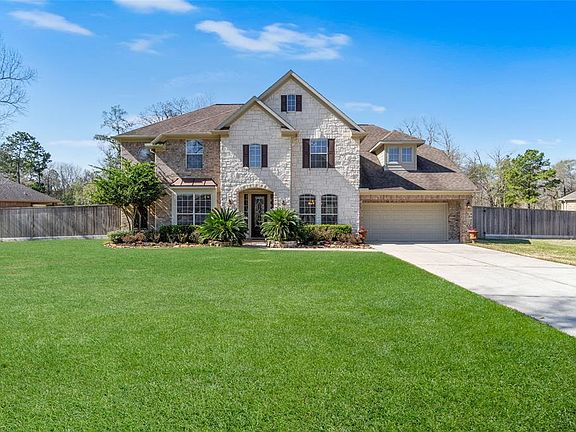 Professionally Landscaped with Large Grassy Area