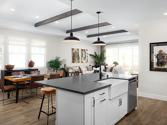 Kitchen with soapstone countertops and luxurious wood flooring