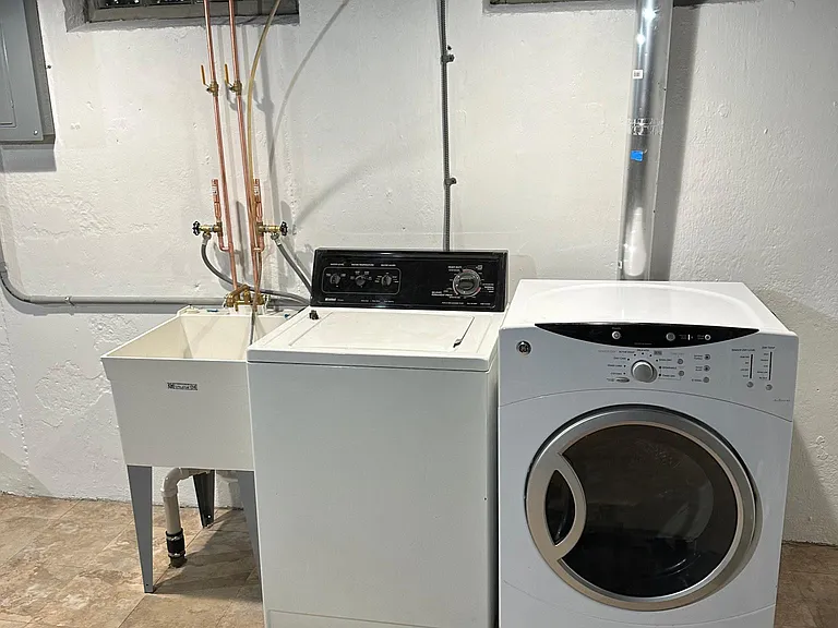 washer, dryer, and new utility tub
