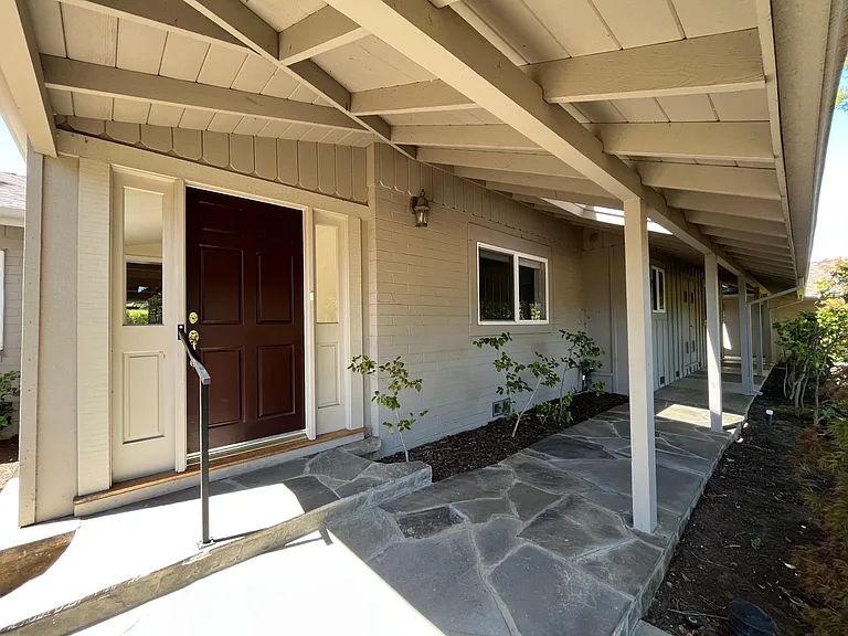 The tranquil stroll through the garden path and the covered walkway