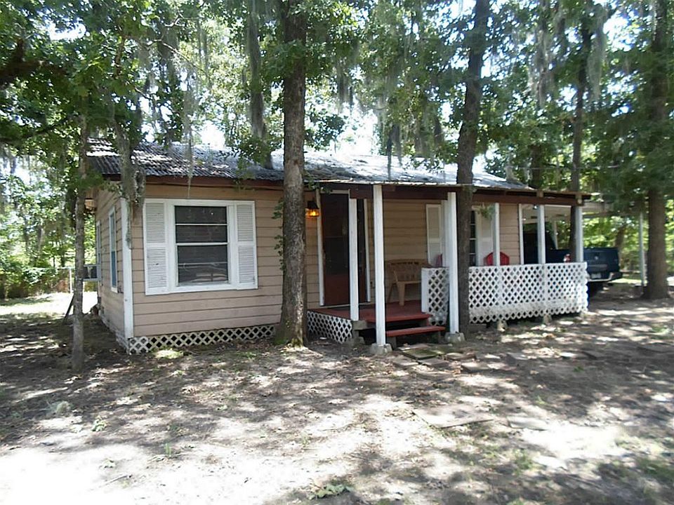 CUTE WATERVIEW LAKE HOUSE , 1 BLOCK FROM OPEN WATERS OF LAKE LIVINGSTON WITH BOAT LAUNCH, FISHING PI