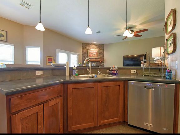 Beautiful modern kitchen that opens to living area.