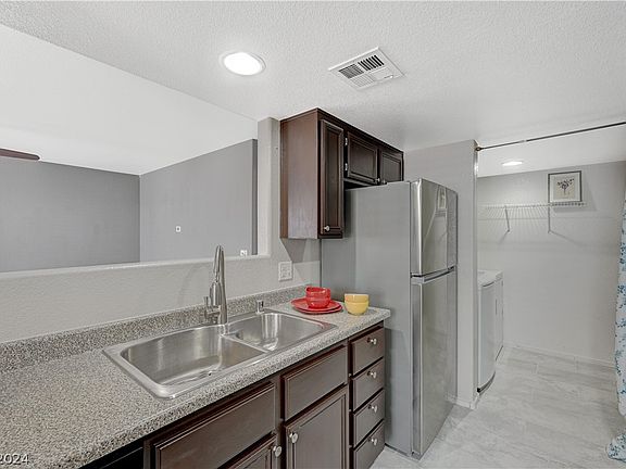 4th image of 5792 Ambassador Ave Unit 103