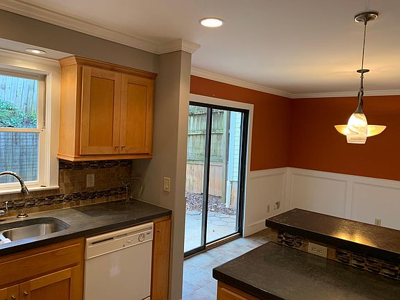 Cement countertops and tile backsplash recently added.