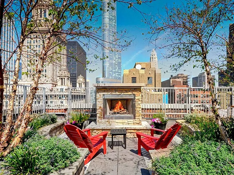 63 E Lake Apartments Sky Park Dining Fireplace