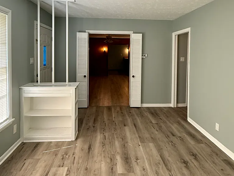 Looking from the living room into the kitchen dining area.