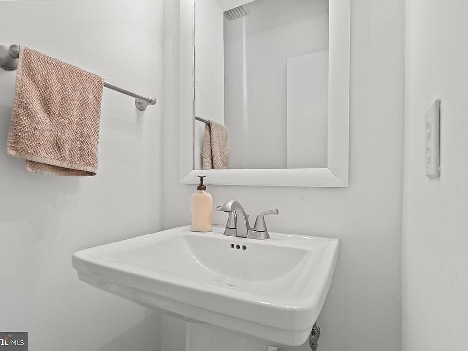 Main level - half bath between entry way and kitchen.