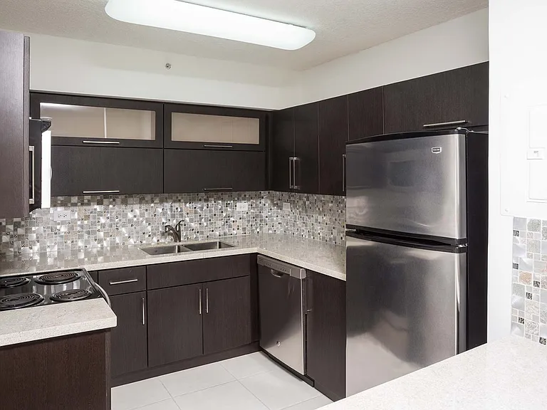 Kitchen features stainless steel appliances