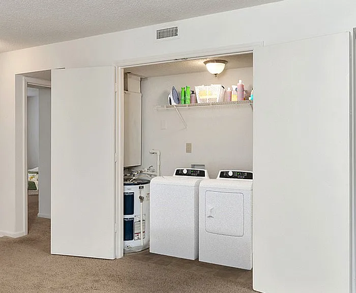 Experience the ease of in-apartment laundry with this well-designed space.