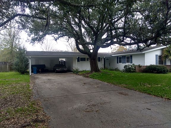 Two car carport with shop