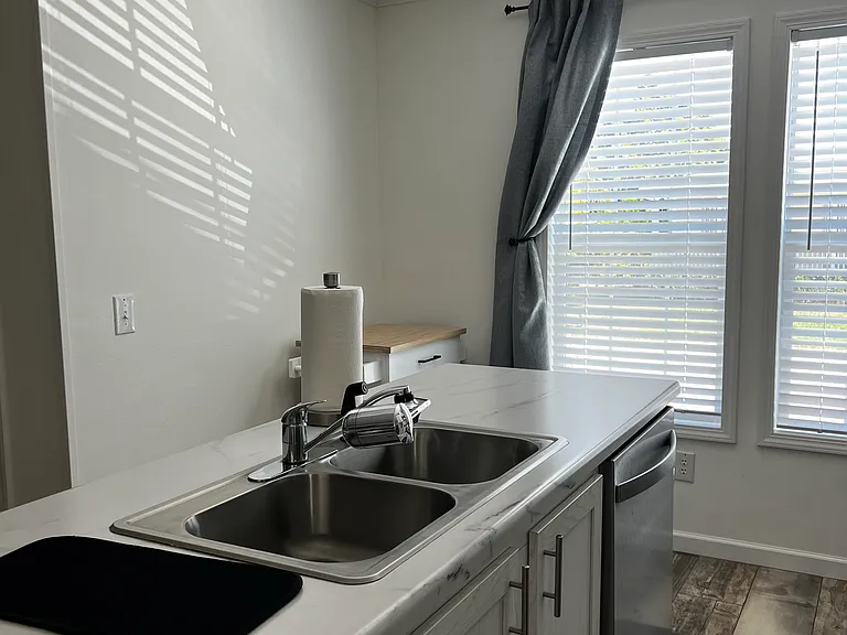 Double sink with garbage disposal, dishwasher and utility cart