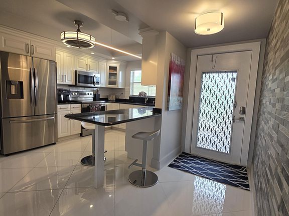 2nd image of 9301 Sunrise Lakes Boulevard #306