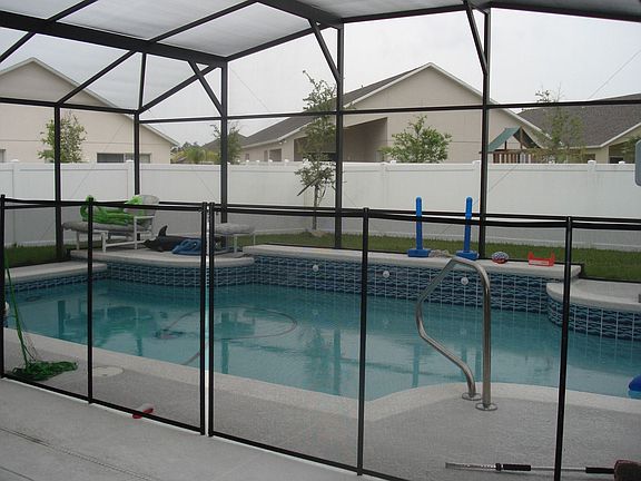 Screened in Pool w/ child proof fence