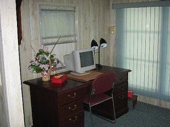5th image of 446 NE Pinelake Village Blvd