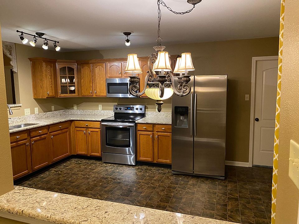 Foyer enters into spacious kitchen.
