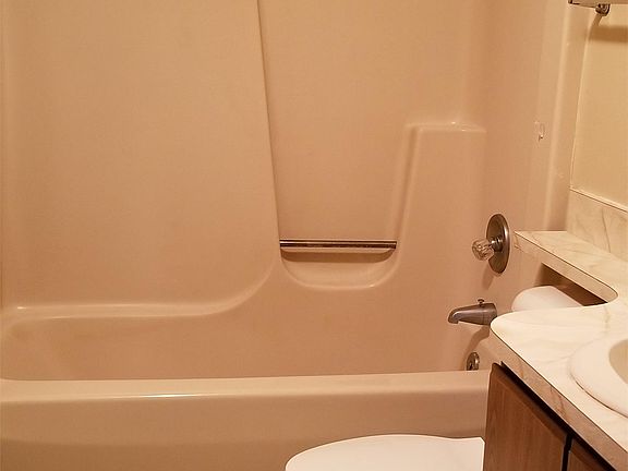 Upper bathroom with tub