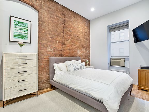 4th image of 23 E 10th St APT 305