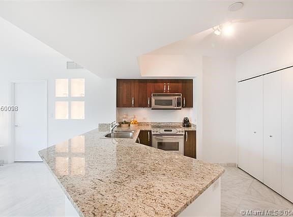 3rd image of 19900 E Country Club Dr APT 1009