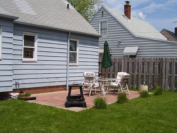 Backyard patio with privacy fence