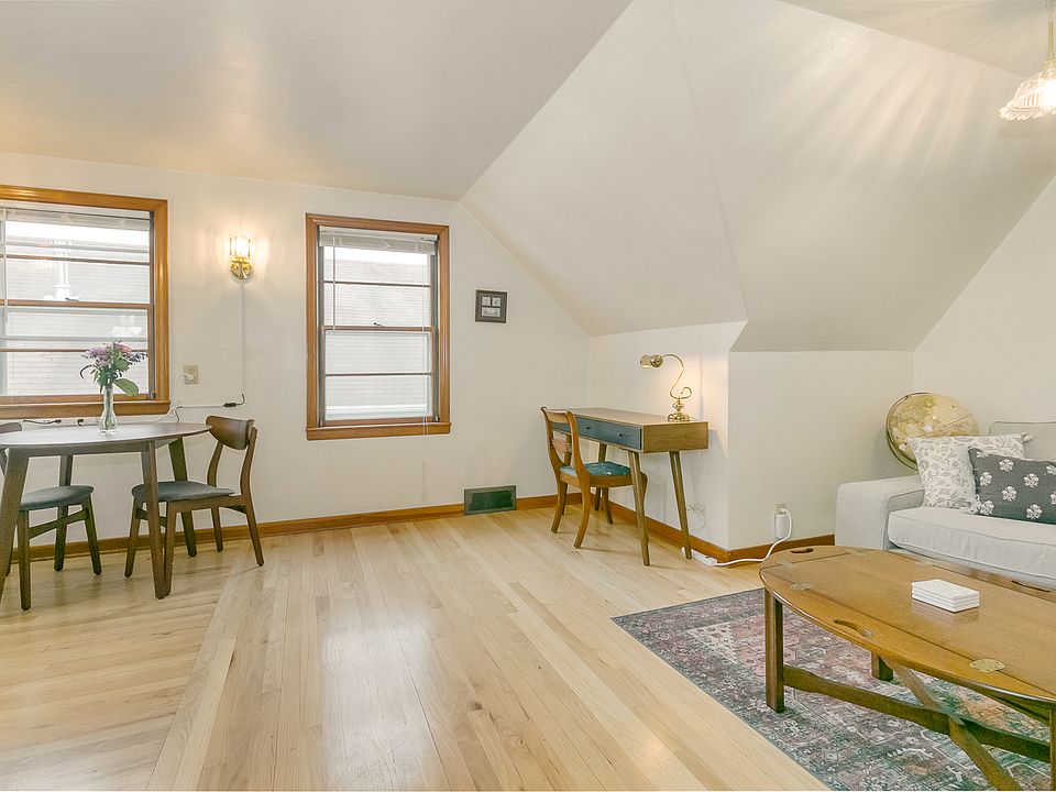 open concept living dining room with working space