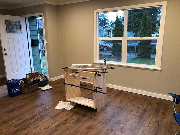 Living Room and Front Entry - new paint, new wood look vinyl planks