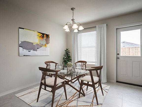 Dining area off kitchen with access to backyard