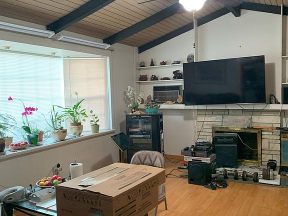 Living room with large window of front yard
