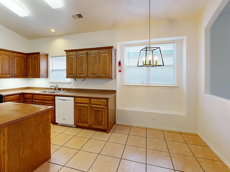 9123 Ashfall Pl NW — Photo 7