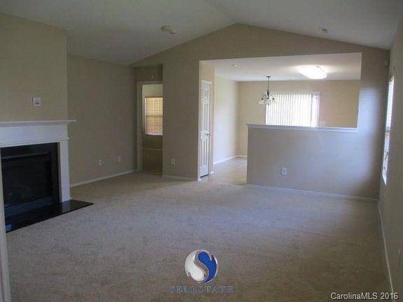 Gas log fireplace in great room.