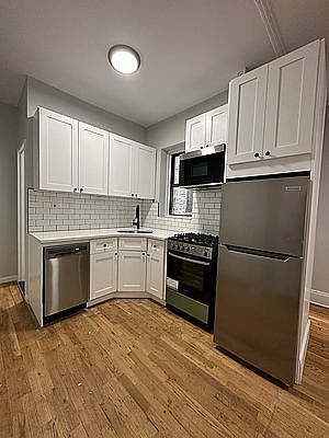 1st image of 311 W 54th St APT 13