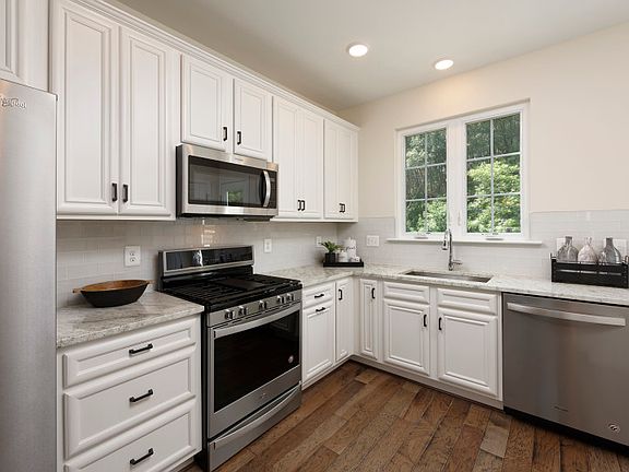 Kitchen with Granite Countertops and Stainless Steel Appliances