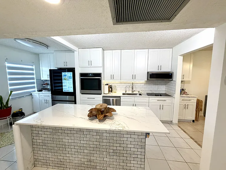 650 SW 124th Ter #202 — Photo 22