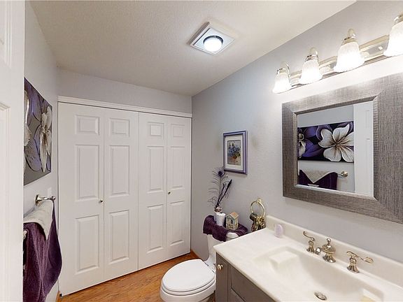 Stylish downstairs half bath and laundry.  