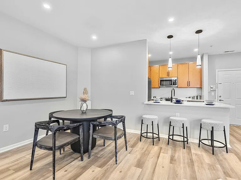 Experience elegance in every corner with this contemporary dining and kitchen space.