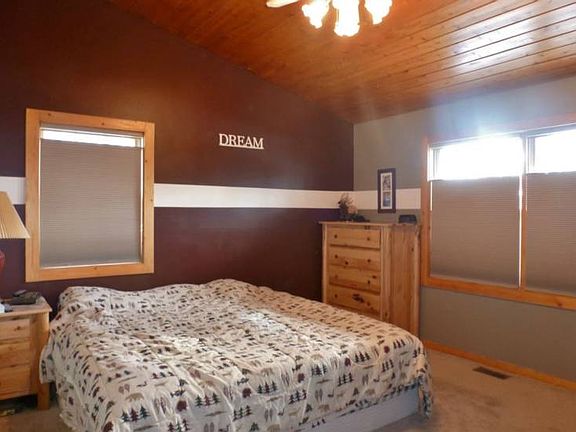 This main floor master bedroom also has the vaulted ceilings.