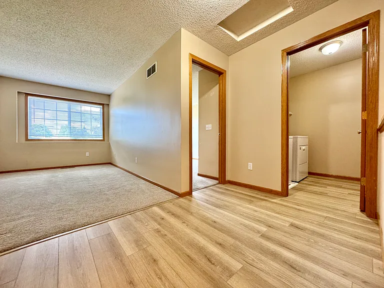 Upstairs entry showing den, guest bedroom and laundry