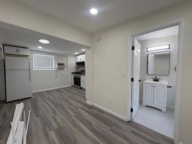 Studio Apartment with luxury vinyl floors, new paint, bathroom and kitchen.