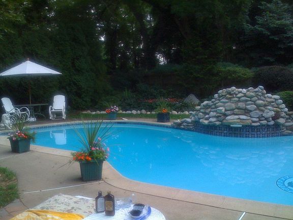 Waterfall hides private spa