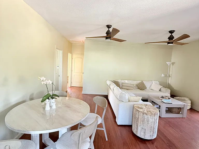 Spacious living room with dining table