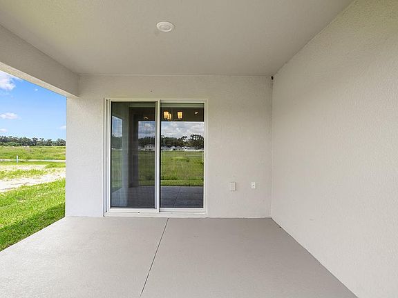 Your interior opens to outdoor living space on a covered lanai.