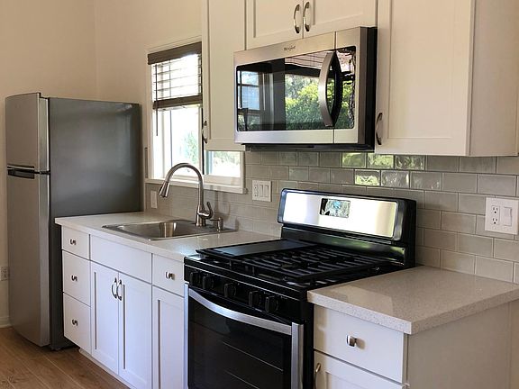 Kitchen with brand new full size appliances.