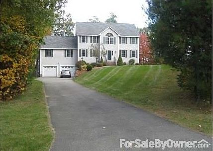 Set off of a Tree-lined Street
						:
						Set just the right distance back you have privacy but also ease of snow removal.