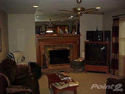 Family room with wbfp, ceiling fan, walk out to deck!