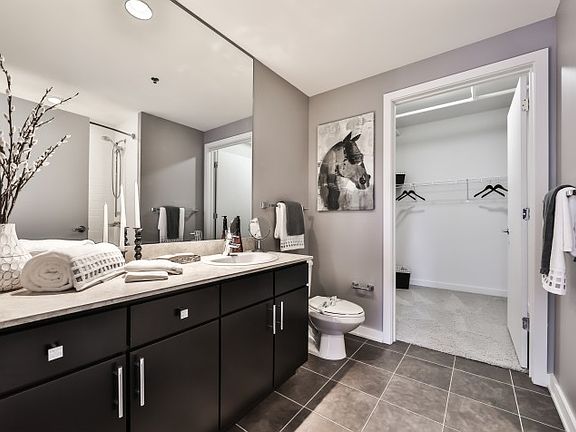 Marble Bathrooms with Ceramic Tile Flooring