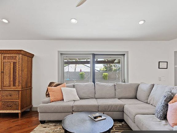 Front door is on right side of picture.
Sliding doors step out onto patio by pool